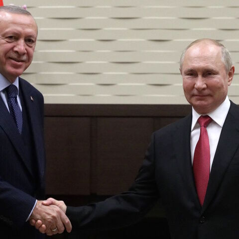 Russian President Vladimir Putin meets with his Turkish counterpart Recep Tayyip Erdogan in Sochi on Sept. 29, 2021. 