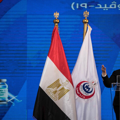 Egyptian Health Minister Hala Zayed gives a press conference in a tent set up outside the Abou Khalifa Hospital, in Ismailia, Egypt, Jan. 24, 2021.