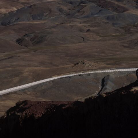 A Turkish Special Forces Police officer is seen standing watch during a press tour at a border outpost.