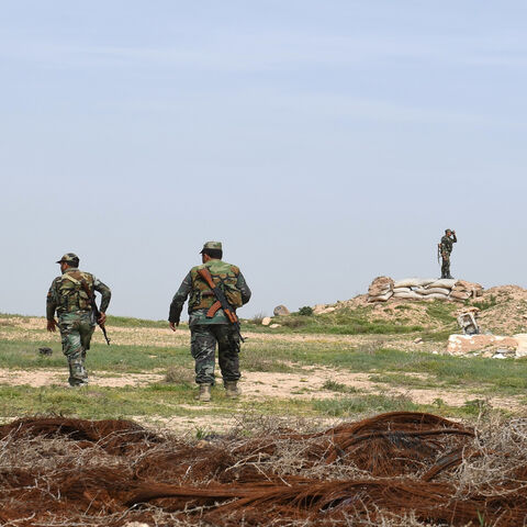 Syrian government forces patrol the northern town of Tel Rifaat, Syria, March 28, 2018.