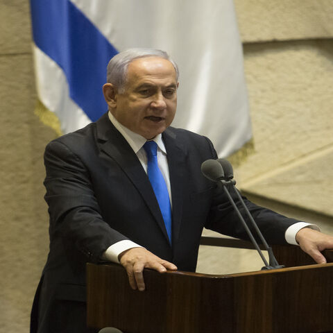 Israeli Prime Minister Benjamin Netanyahu speaks before parliament votes to approve the new government, Jerusalem, June 13, 2021.