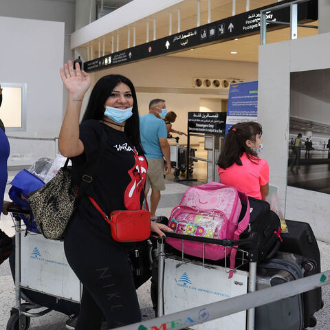 Members of the Abi Haidar family depart from Beirut International Airport on their way to Cyprus, Lebanon, Sept. 2, 2021.