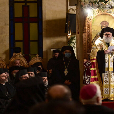 Bishop Ephraim Maalouli (R) speaks at a ceremony, after he was appointed as the new metropolitan of the Greek Orthodox archieparchy of Aleppo and Alexandretta, at Saint Elias Cathedral, Aleppo, Syria, Dec. 10, 2021.