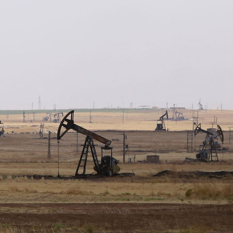 Oil well pumps are seen in the Rmeilane oil field in Hasakah province, Syria, July 15, 2015.