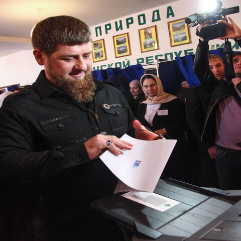 Chechnya's leader Ramzan Kadyrov casts his ballot as he votes during Russia's presidential election at a polling station in the settlement of Tsentoroy, outside Grozny, March 18, 2018.