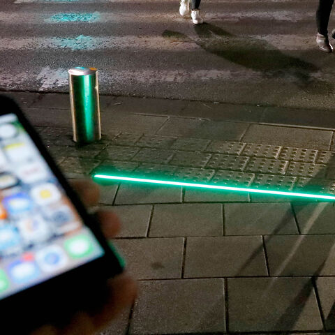 LED ground level lights installed to warn texting pedestrians before crossing the road are seen in the coastal city of Tel Aviv, Israel, March 12, 2019.