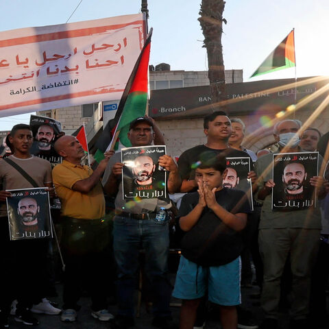 Palestinians rally to denounce the Palestinian Authority following the violent arrest and death in custody of activist Nizar Banat, Ramallah, the West Bank, Aug. 2, 2021.