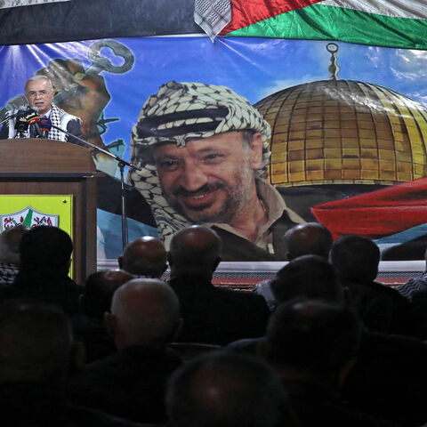 Samir al-Rifai, the Palestinian ambassador to Syria, speaks during a ceremony marking the 57th anniversary of the Fatah movement's foundation at the ravaged Yarmouk camp, south of Damascus, Syria, Jan. 7, 2022.