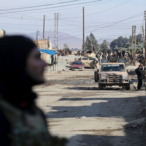Kurdish security forces in Syria's Hasakah on Jan. 22, 2022, amid ongoing fighting with the Islamic State.