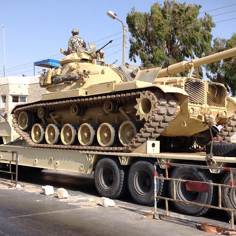 An Egyptian military tank is deployed in the northern Sinai town of Al-Arish on July 16, 2013. 