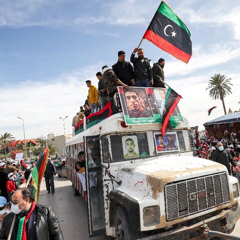 A parade to commemorate the 2011 uprising that toppled Libyan strongman Moamer Kadhafi, in the coastal city of Tajura, east of the capital Tripoli, on February 25, 2022