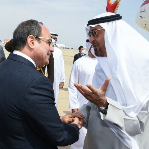 A handout picture released by the Egyptian Presidency on March 21, 2022 shows President Abdel Fattah al-Sisi (L) welcoming Crown Prince of Abu Dhabi Mohammed bin Zayed Al-Nahyan to Sharm el-Sheikh for talks