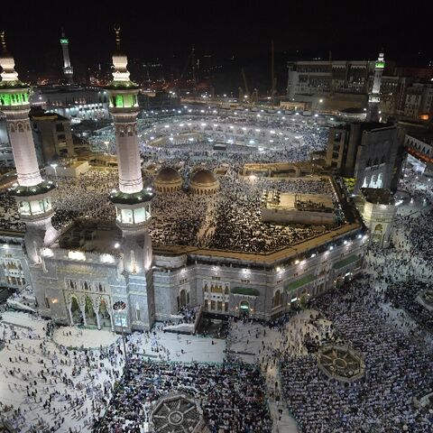 Pilgrims gather at the Grand Mosque in Saudi Arabia's holy city of Mecca on August 7, 2019: Saudi said it will dramatically increase numbers for the hajj in 2022