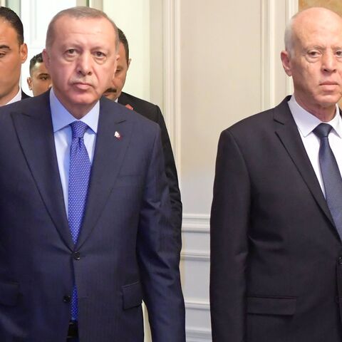 Tunisian President Kais Saied (R) arrives with Turkish President Recep Tayyip Erdogan.