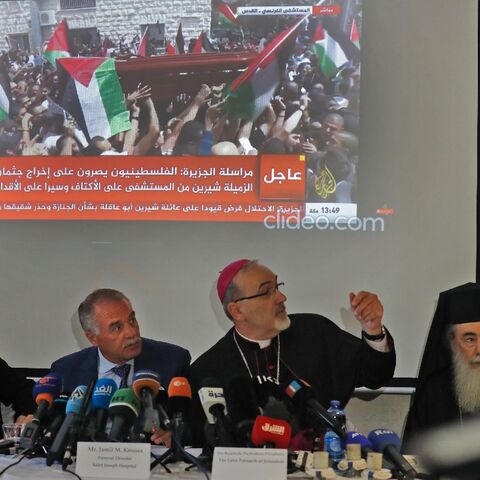 Latin Patriarch of Jerusalem Pierbattista Pizzaballa, at the centre, speaks at a press conference, joined by the Greek Orthodox Patriarch of Jerusalem Theophilos III, right, and the General Director of Saint Joseph Hospital Jamil Koussa