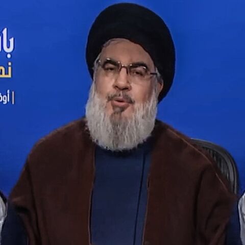 An image grab from Hezbollah's al-Manar TV on May 18, 2022, shows Lebanese Shiite movement Hezbollah leader Hassan Nasrallah delivering a speech
