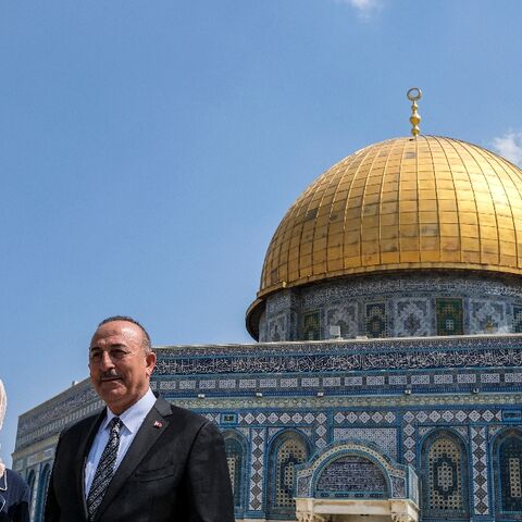 Turkish Foreign Minister Mevlut Cavusoglu and his wife Hulya visit the Al-Aqsa mosque compound in the Old City of Jerusalem