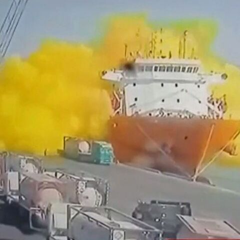 Footage on state TV showed a large cylinder plunging from a crane on a moored vessel, causing a violent explosion of yellow gas in Jordan's Aqaba port 