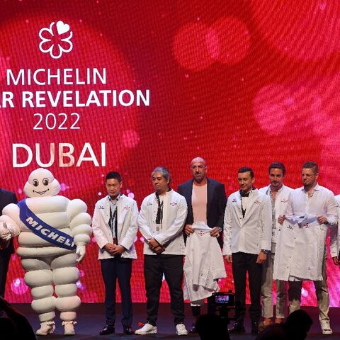 Chefs and owners pose for photographs as 11 Dubai restaurants are awarded the first Michelin stars in the Middle East