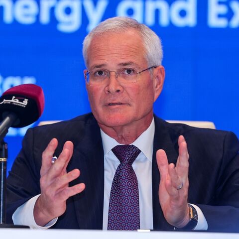 Exxon Mobil Corporation's Chairman and CEO Darren Woods speaks during a press conference and signing ceremony at QatarEnergy headquarters in Doha, on June 21, 2022