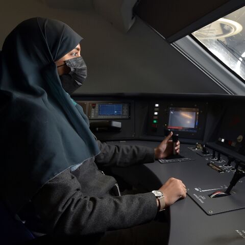Driver Raneem Azzouz takes her seat at the helm of a high-speed train ferrying pilgrims to Mecca, less than five years after Saudi authorities gave women the right to drive road vehicles