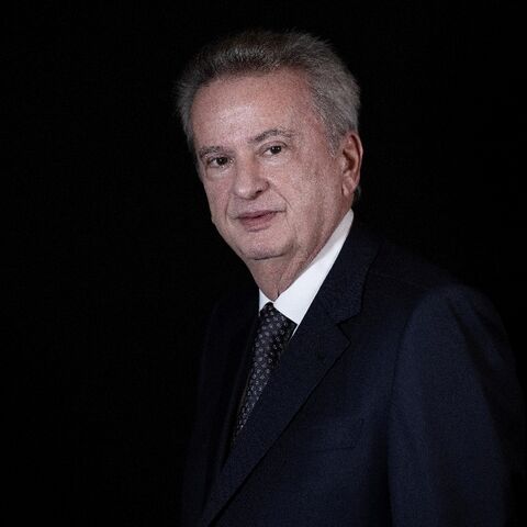 Lebanon's central bank governor Riad Salameh poses during a studio photo session in the capital Beirut, on December 20, 2021