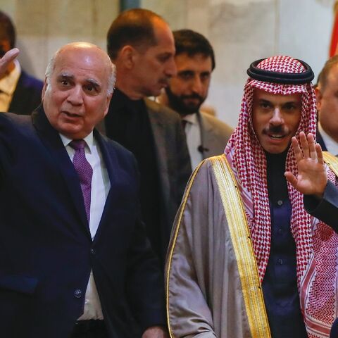 Iraqi Foreign Minister Fuad Hussein and his Saudi counterpart Faisal bin Farhan in Baghdad on February 2, 2023