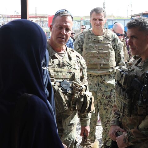 US Central Command chief General Michael Kurilla visits a detention camp for relatives of suspected jihadists run by Kurdish authorities in northeastern Syria
