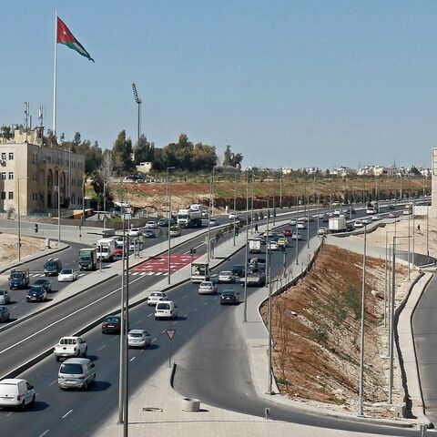 Vehicles drive in Amman on February 22, 2023. (Photo by Khalil MAZRAAWI / AFP) (Photo by KHALIL MAZRAAWI/AFP via Getty Images)