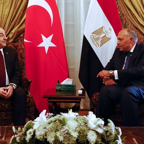 Turkish Foreign Minister Mevlut Cavusoglu (L) holds Cairo talks with Egyptian counterpart Sameh Shoukry as the two governments move to repair ties