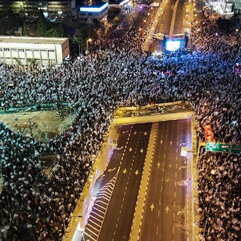 Many of the protesters in the coastal city of Tel Aviv were waving Israeli flags