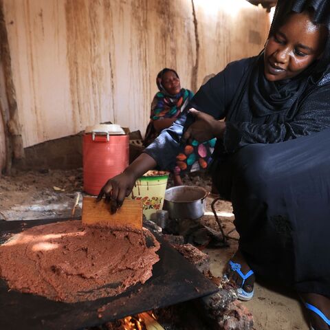 Sudanese women prepare 'helo-murr', a drink synonymous with the Islamic holy month of Ramadan