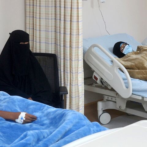 Relatives visit patients during the inauguration of a refurbished hospital in Aden on May 10, 2023