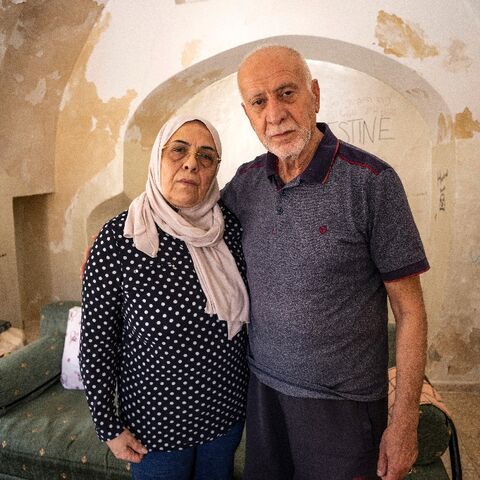 Palestinian couple Nora and Mustafa Sub Laban pose for a picture in their home in the walled Old City of Israeli-annexed east Jerusalem, which they are set to lose of Jewish settlers after a 45-year legal battle