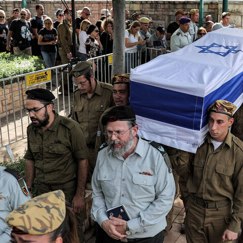 Israeli soldiers carry the coffin of Lia Ben Nun, one of three soldiers killed in the cross-border incident with Egypt, during the funeral in Rishon Lezion, June 4, 2023.