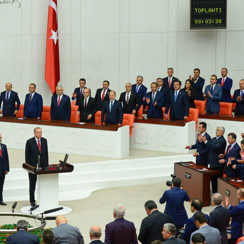 Turkey's President Recep Tayyip Erdogan receives his oath as he is sworns as Turkey's first Executive President at the Turkish parliament on July 9, 2018 in Ankara, Turkey. President Erdogan was sworn in during a parliamentary meeting and later an inauguration ceremony attended by a number of foreign leaders and dignitaries. President Erdogan secured another five year term and increased powers after winning 52.5 percent of the vote in the June 24 snap presidential and parliamentary elections. Under the new 