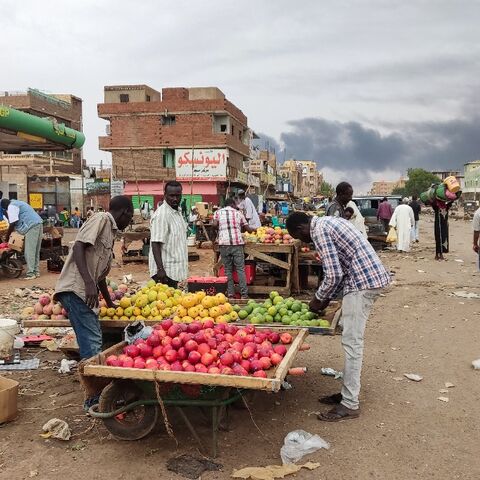 Khartoum residents take advantage of a lull in fighting in the first few hours of Saturday's truce to stock up on fruit and other basic goods that have been in short supply