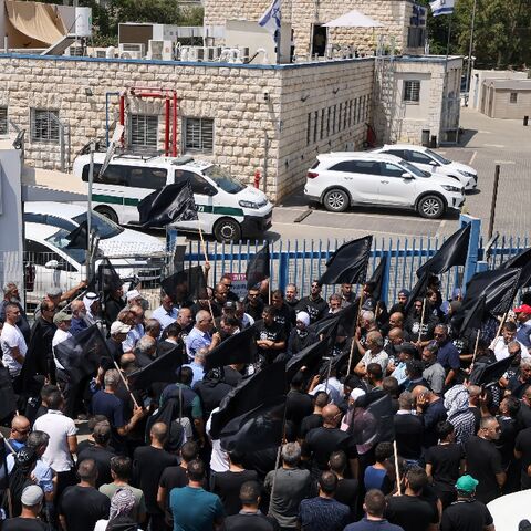 Arab Israelis protest outside a police station during the funeral for the director-general of Tira city, the latest victim of a crime wave in the Arab-Israeli community