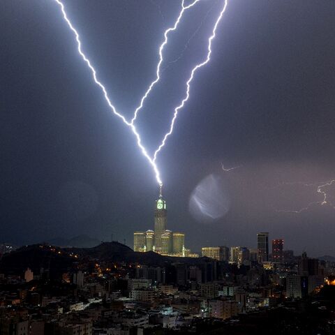 Lightning strikes the clock tower in the Saudi city of Mecca, home to Islam's holiest site