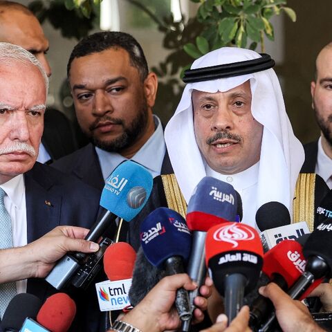 Saudi ambassador Nayef bin Bandar al-Sudairi speaks to journalists, joined by Palestinian foreign minister Riyad al-Maliki, on the left