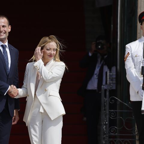 Malta’s Prime Minister Robert Abela (L) welcomes Italian Prime Minister Giorgia Meloni
