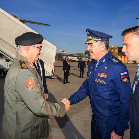 Military strongman Khalifa Haftar, whose forces dominate eastern Libya, is seen being welcomed by Deputy Defence Minister Yunus-Bek Yevkurov at a Moscow military airfield on Tuesday in this photograph released by his forces