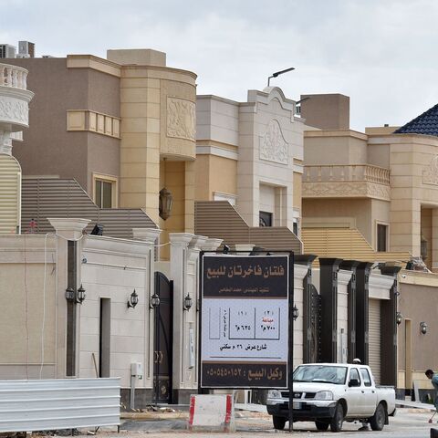 Foreign labourers work on the construction of new luxury houses in the Saudi capital Riyadh on April 13, 2019. - Housing is a potential lightning rod for public discontent in a country where affordable dwellings are beyond the reach of many, posing a key challenge for Crown Prince Mohammed bin Salman as he seeks to overhaul the oil-reliant economy. (Photo by FAYEZ NURELDINE / AFP) (Photo credit should read FAYEZ NURELDINE/AFP via Getty Images)