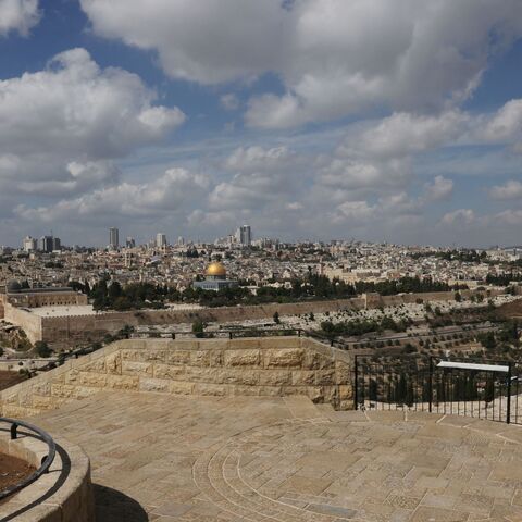A photo taken on October 11, 2023 shows the empty Mount of Olives touristic site overlooking Jerusalem's Dome of the Rock (background), as the ferocious war between Israel and the Palestinian Hamas movement further south enters its fifth day. Hamas has branded its coordinated land, air and sea offensive against Israel that began on October 7 "Operation Al-Aqsa Flood". (Photo by AHMAD GHARABLI / AFP) (Photo by AHMAD GHARABLI/AFP via Getty Images)