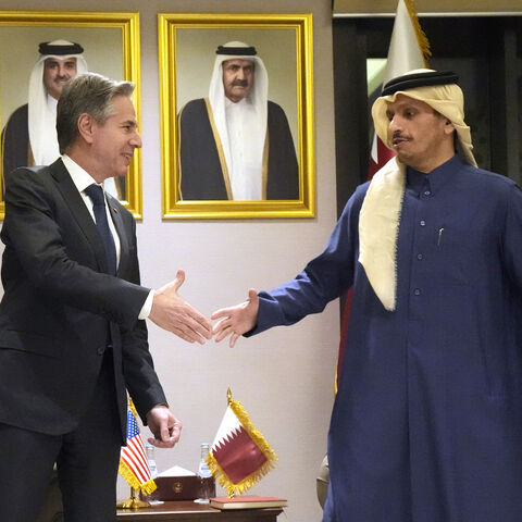 US Secretary of State Antony Blinken (L) meets with Qatar's Prime Minister and Foreign Minister Sheikh Mohammed bin Abdulrahman al-Thani, at Diwan Annex, in Doha on February 6, 2024, during his Middle East tour, his fifth urgent trip to the region since the war between Israel and Hamas in Gaza erupted in October. (Photo by Mark Schiefelbein / POOL / AFP) (Photo by MARK SCHIEFELBEIN/POOL/AFP via Getty Images)