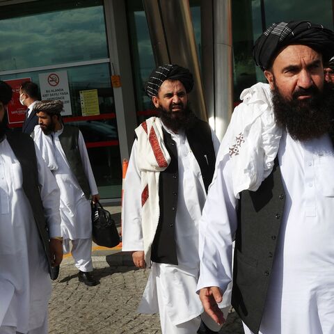 Member of the Taliban delegation Khairullah Khairkhwa (R) arrives at Ankara Esenboga Airport on Oct. 14, 2021.
