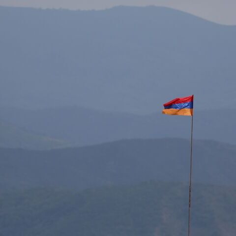This photograph taken on Sept. 22, 2023, shows an Armenian flag fluttering near the border with Azerbaidjan near Kornidzor. 