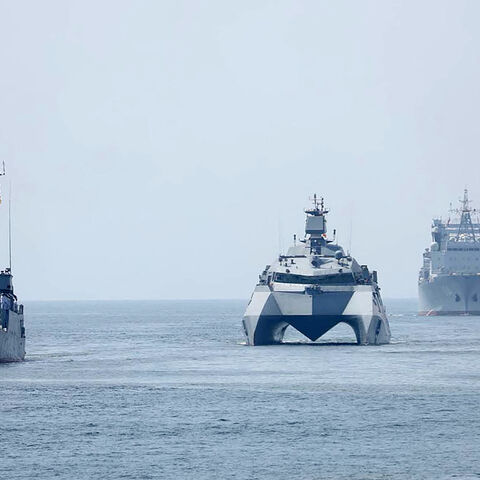 This handout photo made available by the Iranian Army Office on March 12, 2025 shows navy vessels taking part in a joint Iranian-Russian-Chinese military drill in the Gulf of Oman. 