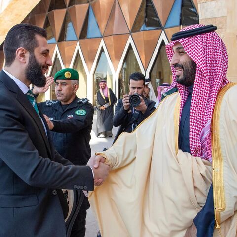 Saudi Crown Prince Mohammed bin Salman is greeting Syria’s interim president, Ahmad al-Shara, left, during his arrival on Sunday at the royal palace in Riyadh, Saudi Arabia