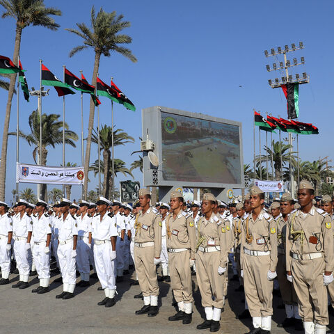 Libyan soldiers take part in a military parade marking the 82nd anniversary of the Libyan army, in the capital Tripoli on Aug. 9, 2022.